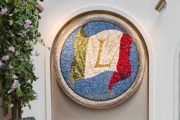 Giulia Manzoni Lucarelli restaurant mosaic logo