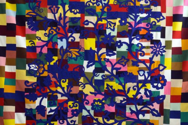 Maria Dinis Pereira Patchwork blanket with embroidered wool felt applique